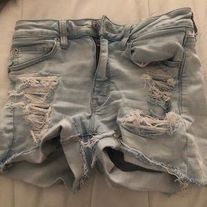 light wash jean shorts with rips